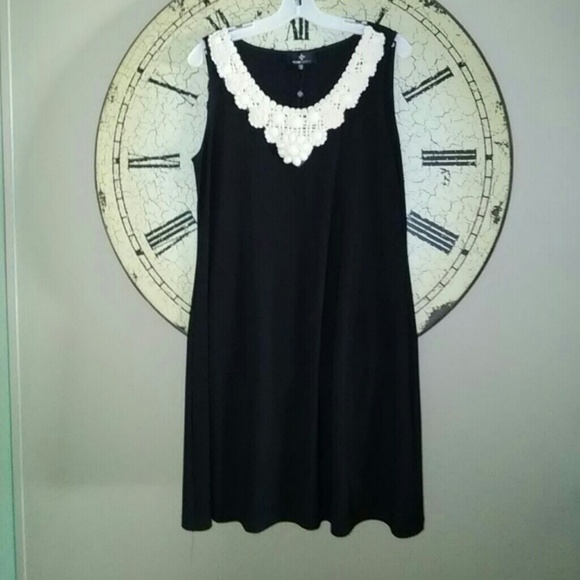 Bonnie Nicole Dresses & Skirts - Elegant Black Midi Dress with White Lace Detail